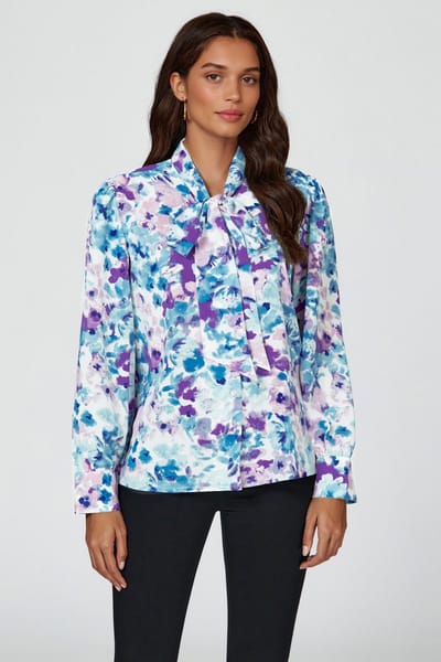 Blousetop met lange mouwen en abstract bloemenprint en strikdetail in blauw