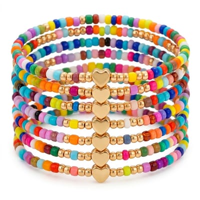 Meerkleurige kralen armbandenset dames en meisjes met hartje bedel elastische kralen armbanden set van 7 stuks met kleine kralen en goudkleurige details