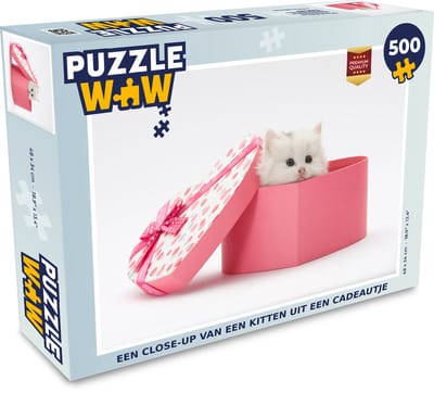 Puzzel Een close-up van een kitten uit een cadeautje - Legpuzzel - Puzzel 500 stukjes