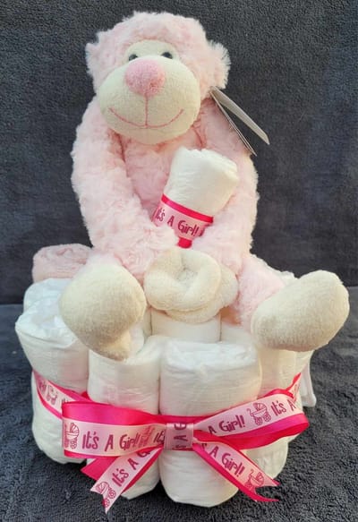Luiertaart Its a girl - roze -strik - funnies - kruidvat - sokjes - kraamgeschenk