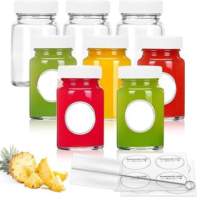 Famanu - 60 ml glazen flesjes met deksel en labels, herbruikbare mini-flessen voor sap, gembershots en wellnessdrankjes – Transparant