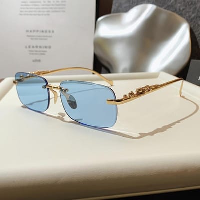 1 stuks Unisex Randloos Modebril Gouden Metalen Montuur Blauwe Transparante Glazen Stijlvolle Bril gray