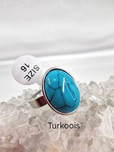 Ring - RVS - Turkoois - Edelsteen - Maat 20 - Ovaal - Zilverkleurig. Edelsteen ringen zijn niet alleen prachtige sieraden, maar ook dragers van diepe betekenis en symboliek.