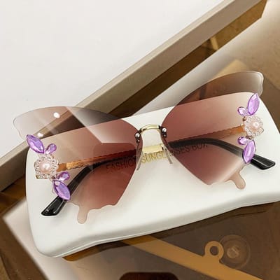 Lunettes de soleil premium papillon design Montures rétro pour femmes Lunettes sans monture élégantes Lunettes de soleil avec diamants Bling Uv400 As shown in the figu