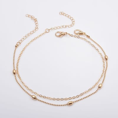 2 Enkelbandjes met ovaaltjes | goud gekleurd