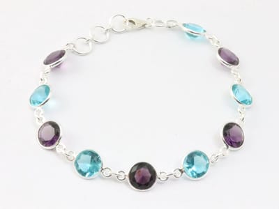 Zilveren armband met amethist en blauwe topaas