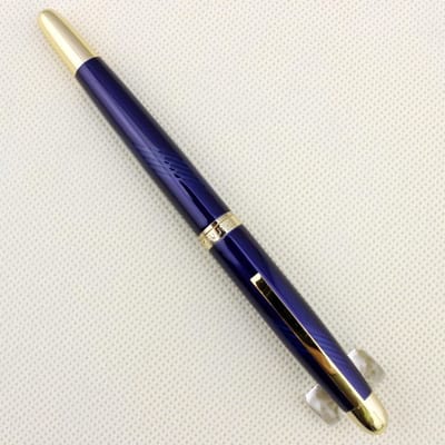 Prachtige vulpen voor senioren met paarse accenten, ideaal als cadeau voor schrijfliefhebbers