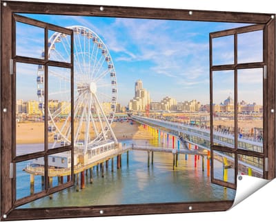Gards Tuinposter Doorkijk Scheveningen Pier met de Ferris Wheel - Reuzenrad - 150x100 cm - Tuindoek - Tuindecoratie - Wanddecoratie buiten - Tuinschilderij