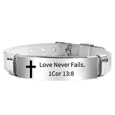 Christelijke Armband Unisex - Met Kruis & Bijbeltekst (1 Korintiërs 13:8) - Zilverkleurig Siliconen & RVS - Verstelbaar & Stijlvol - Betekenisvol Geloof Cadeau