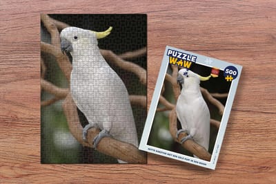 Puzzel Witte kaketoe met een gele kuif in een boom - Legpuzzel - Puzzel 500 stukjes