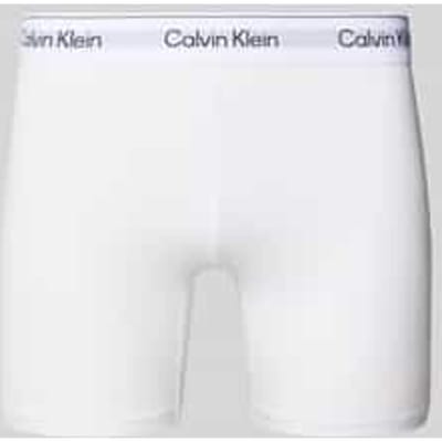 Broek met label in band