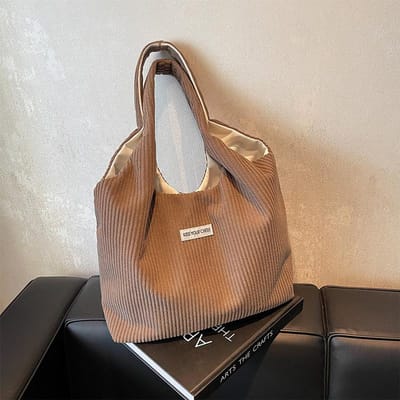 Niche Casual Tas voor Dames Nieuwe Corduroy Gestreepte Schoudertas voor Studenten Forenzen Geplooide Vroege Acht Okseltas brown