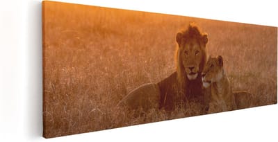 Artaza Canvas Schilderij Leeuw En Leeuwin - 60x20 cm - Muurdecoratie Dieren - Wanddecoratie Zonsondergang - Kamer Accessoires Savanne