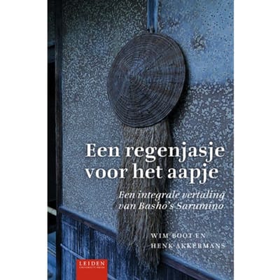 Een Regenjasje Voor Het Aapje