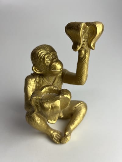 Gouden aap in Oosterse look