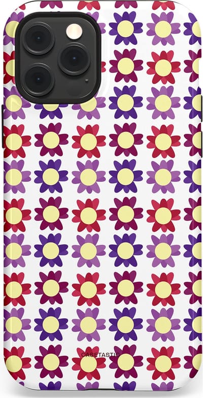 Casetastic Hoesje Geschikt voor Apple iPhone 12/12 Pro Magsafe - Stijlvolle Beschermende Duo-layer Case - Rood Paarse Roze Madelief Bloementjes