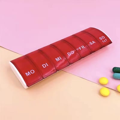 CHPN - Pillendoos - Medicijnendoos - Pillenbox - 7 dagen -7-vaks - Medicine box - Medicijnen bewaren - Vakantie accessoire - Universeel - Compact - Roze/rood