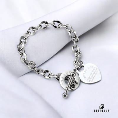 Leerella Dames Schakelarmband Zilverkleur met Hartje Hanger en Knevelsluiting - RVS - 18 cm - Perfect Cadeau voor Moederdag, Valentijnsdag en Verjaardag