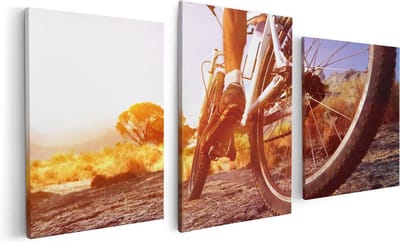 Artaza Canvas Schilderij Drieluik Mountainbike Fietser op Stenen bij Zonsopgang - 120x60 - Foto Op Canvas - Canvas Print