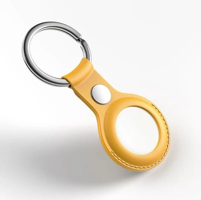 Hoesje geschikt voor AirTag - AirTag sleutelhanger - Kunstlederen case - Airtag protector - Hanger - Geel - Spullen kwijtraken - Jonyx