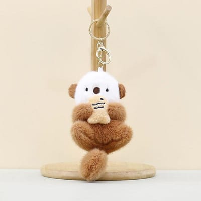 Loutres Mignonnes Tenant du Poisson Porte-clés Peluche Porte-clés de Sac à Dos Élégants Animal Mignon Porte-clés de Sac d'École Porte-monnaie Jouet Cadeau Étudiant marron