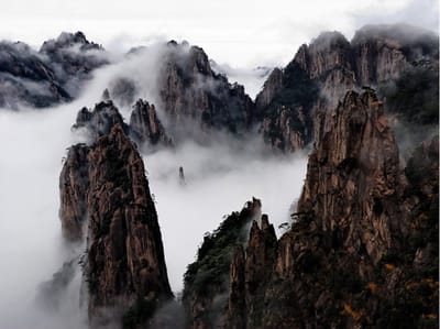 Fotobehang - Zee van wolken in Huangshan Mountain, China.