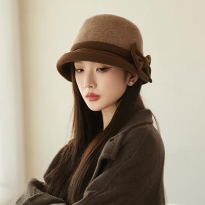 Koreaanse Versie van Herfst en Winter Nieuwe Hoed voor Dames met Strik Wollen Vissershoed Elegant en Warm Kleine Emmerhoed die een Trendy Gezicht laat zien One Size black