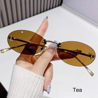Modieuze Ovale Zonnebril voor Vrouwen Luxe Kwaliteit Letter Decor Zonnebril Trendy Randloze Cat Eye Bril UV400 Bescherming Metaal Tea black