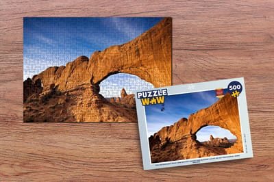 Puzzel Een natuurlijke brug van rotsen onder een blauwe lucht in het Nationaal Park Arches - Legpuzzel - Puzzel 500 stukjes