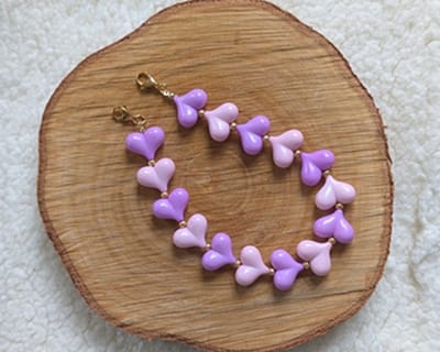 SWAN - sleutelhanger - tassenhanger - telefoonkoord - hartjes - acryl - lila - lichtroze - roze - goud