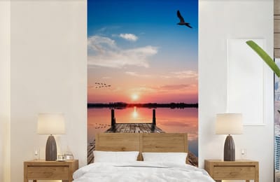 Behang - Fotobehang Steiger - Water - Zonsondergang - Roze - Horizon - Breedte 120 cm x hoogte 240 cm