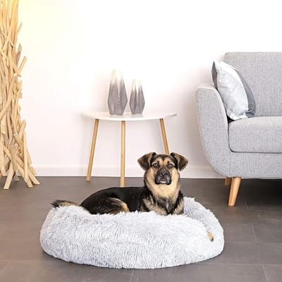 Famanu - Donutbed voor honden en katten, pluizig rond hondenbed voor kleine en grote huisdieren, (XL) 70 cm Ø, zacht kattenbed van knuffelpluche, hondenkussen met extra dikke vulling, lichtgrijs
