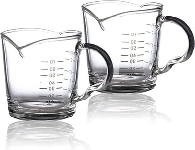 Dubbelwandig 70ml espresso glas met handvat en maatverdeling voor koffie en melk, hittebestendig en ideaal voor barista's