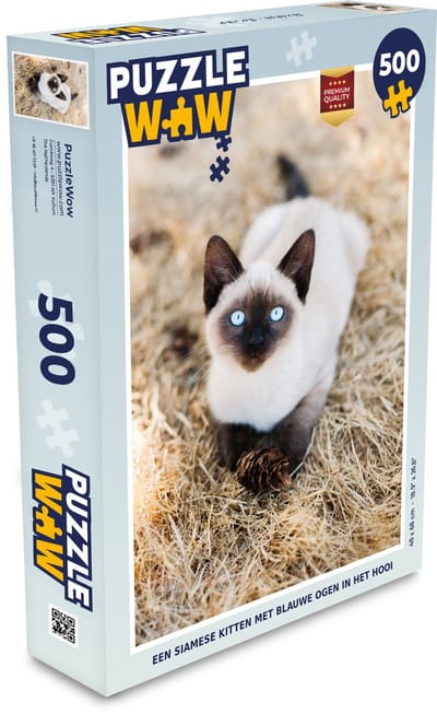Puzzel Een siamese kitten met blauwe ogen in het hooi - Legpuzzel - Puzzel 500 stukjes