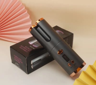 Draadloze automatische haarkruller haarkrul apparaat zwart goud inclusief haarkam en klemmetjes.
