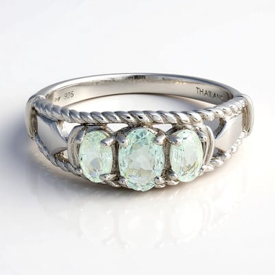 Cavill - Zilveren Ring 925 Sterling - 0,63 ct Mozambique Paraiba Toermalijn - Gevlochten Design - Ovale Steenzetting - Elegante Damesring