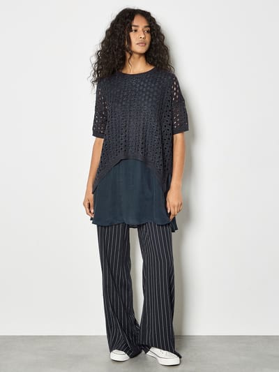 Glanzende tuniek met mesh-lagen
