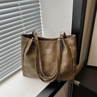 Tas met grote capaciteit voor dames in de lente Veelzijdige nieuwe eenvoudige schoudertas Textuur Damesketting Pendel Draagtas black