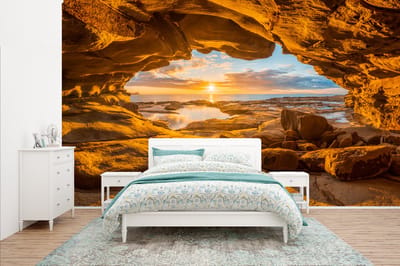 Behang - Fotobehang Grot - Zee - Horizon - Zonsondergang - Breedte 435 cm x hoogte 260 cm