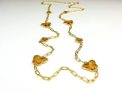 lange zilveren halsketting collier halssnoer geelgoud verguld Model Vlinder en Bol met amber bruine stenen