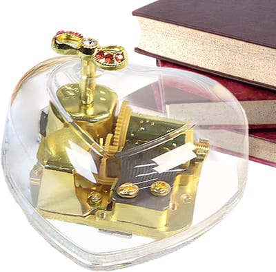 Muziekdoos Hartvormig - Decoratief Doosje - Romantisch Cadeau - Gouden Figuurtjes - 8 x 7 cm - Transparant