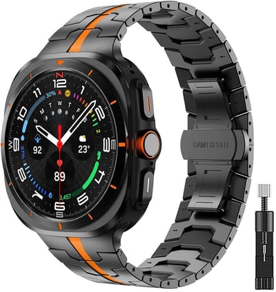 Stravo Premium Zakelijke Metalen bandje 'Iron' – Geschikt voor Samsung Galaxy Watch Ultra 2 (2026) / Ultra (2024/2025) – Stijlvol en Zakelijk Horlogebandje met Vlindersluiting voor Galaxy Watch Ultra 47mm – Inclusief Horloge-inkortset (Zwart/oranje)