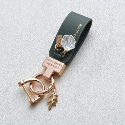 Porte-clés en cuir PU avec pendentif en forme de feuille et coquillage, accessoire tendance pour femmes et hommes, idéal pour la voiture, le téléphone, cadeau idéal pour un couple