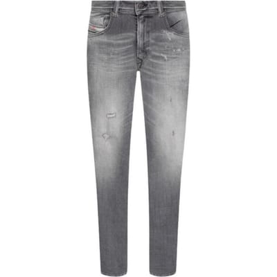 Diesel Mannen 1979 Sleenker Vervaagde Franje Rand Jeans (Grijze Denim)