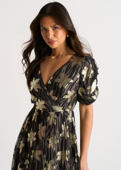 Zwarte jurk met bloemenprint en lurex, met overslag aan de voorkant