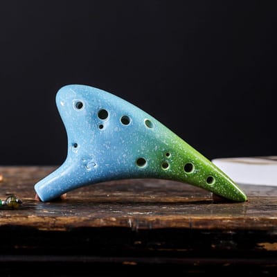 Instrument de musique de style étoilé Ocarina Alto C en céramique à 12 trous avec vert/bleu