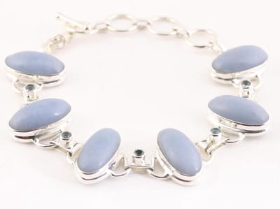 Zware zilveren armband met angeliet en blauwe topaas