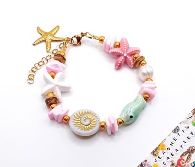 Jeannette-Creatief® - Beach - Armband Pink & Mintgreen Fish Seastars Czech Glaskraal Ammoniet Kokos Zoetwaterparel Schelp Miyuki Galvinised Gold - Armband - Schelpenarmband - Mermaidcore - Kokosarmband - Schelpenarmband - Bedelarmband - Moederdag