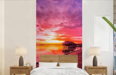 Behang - Fotobehang Steiger - Water - Zon - Roze - Horizon - Breedte 120 cm x hoogte 240 cm