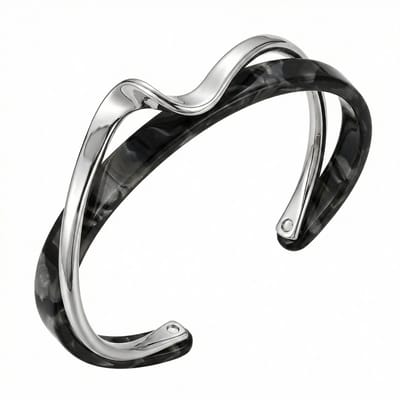 Zilverkleurige en zwarte bangle armband voor dames – metalen armband met golvend design